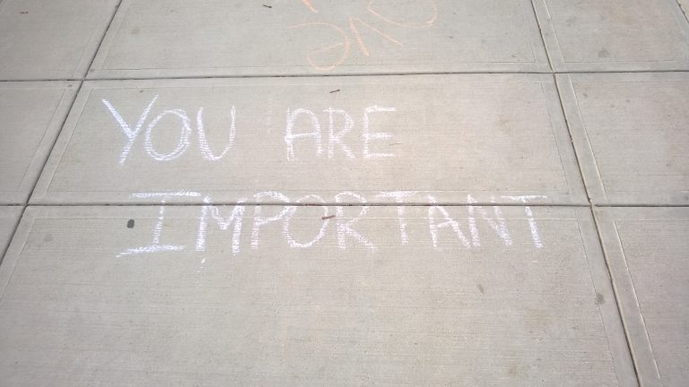 'You are important' written on the ground