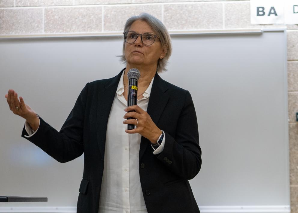 KU Provost Barb Barbara Bichelmeyer with microphone speaking at Teaching Summit.