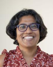 Image of a woman smiling at the camera