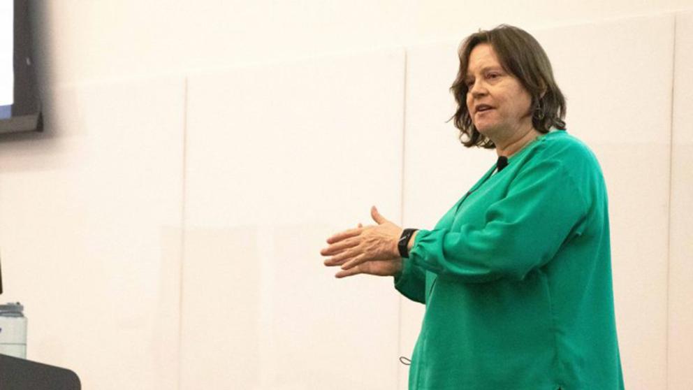 Martha Oakley speaks at Beren Auditorium on the KU campus.
